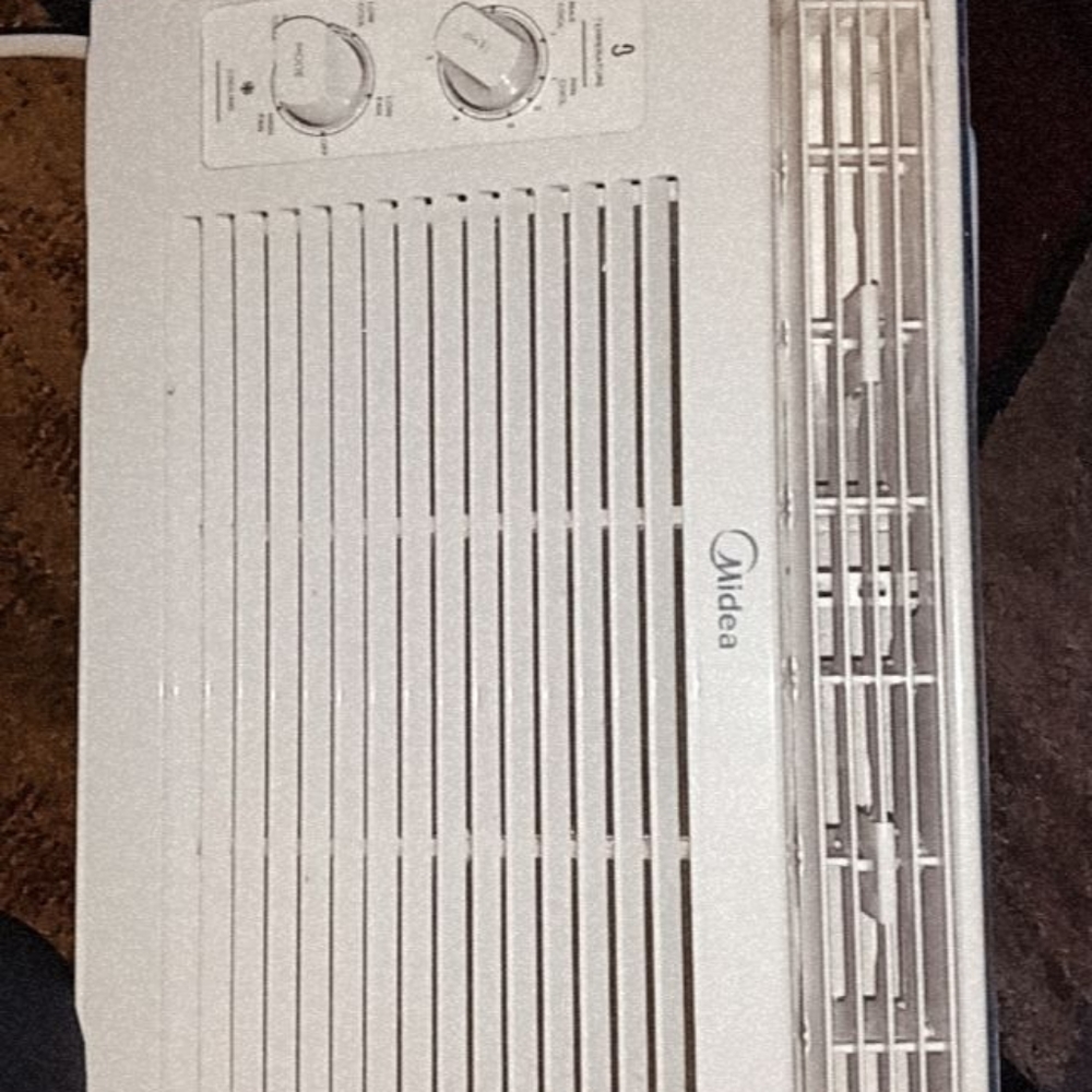 White , Midea air conditioning